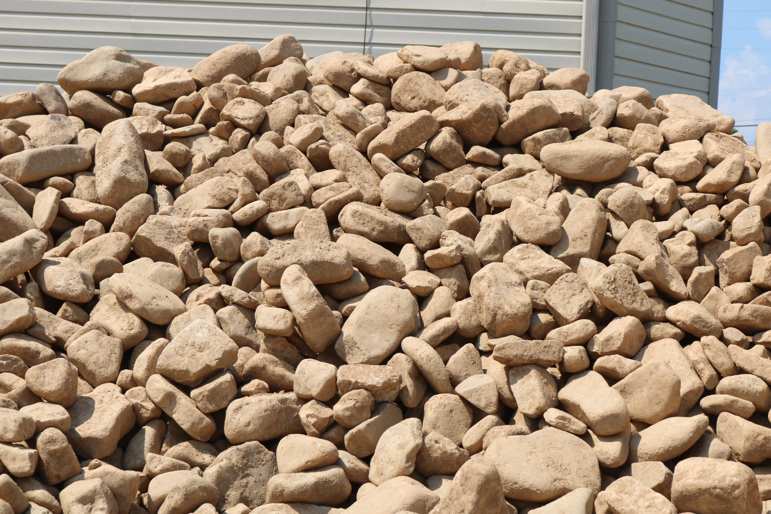 Bulk Pile of 4-8 Inch River Rock - Durable Stone from Pine Straw King