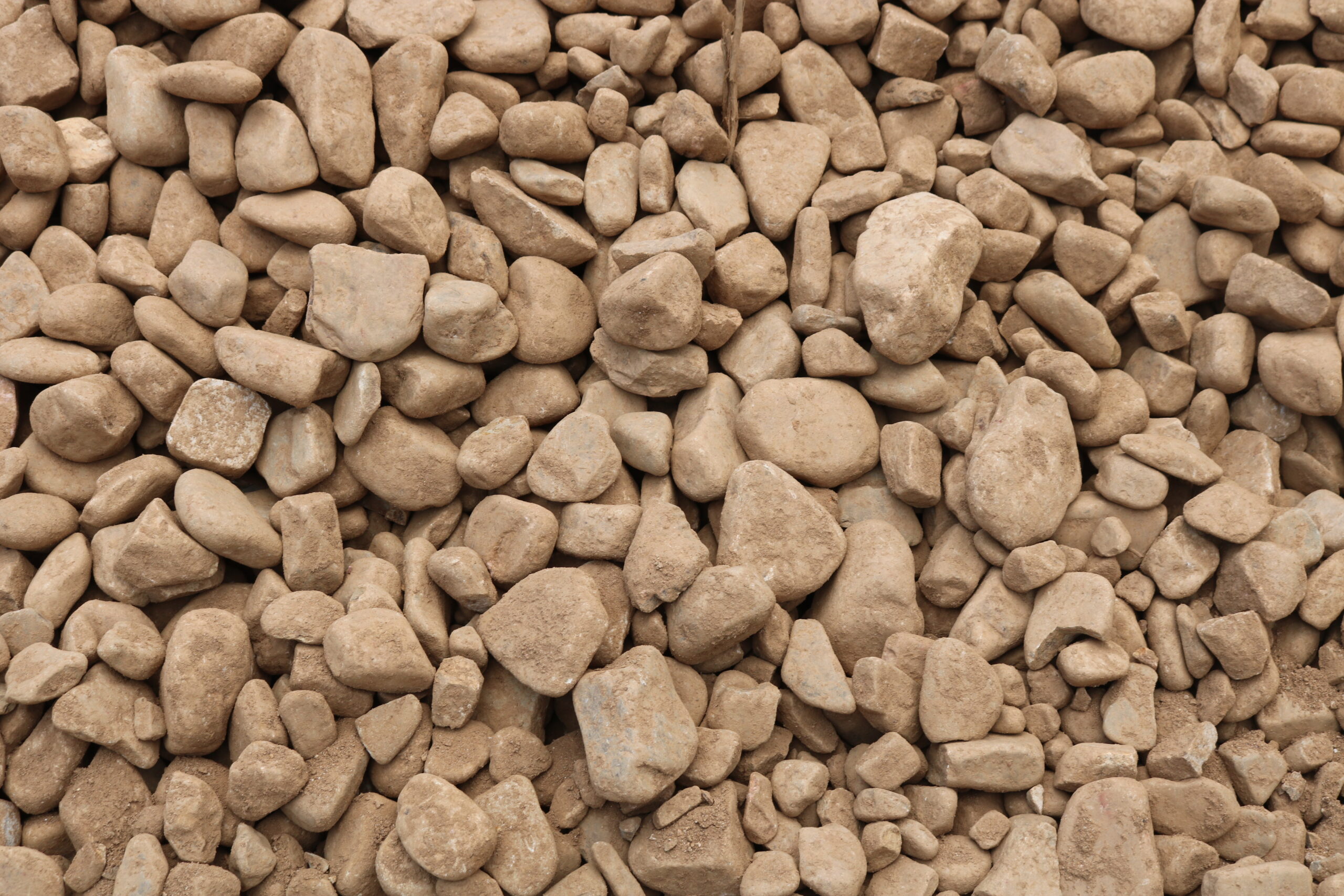 Variety of 2-4 Inch River Rock in Bulk - Pine Straw King Selection