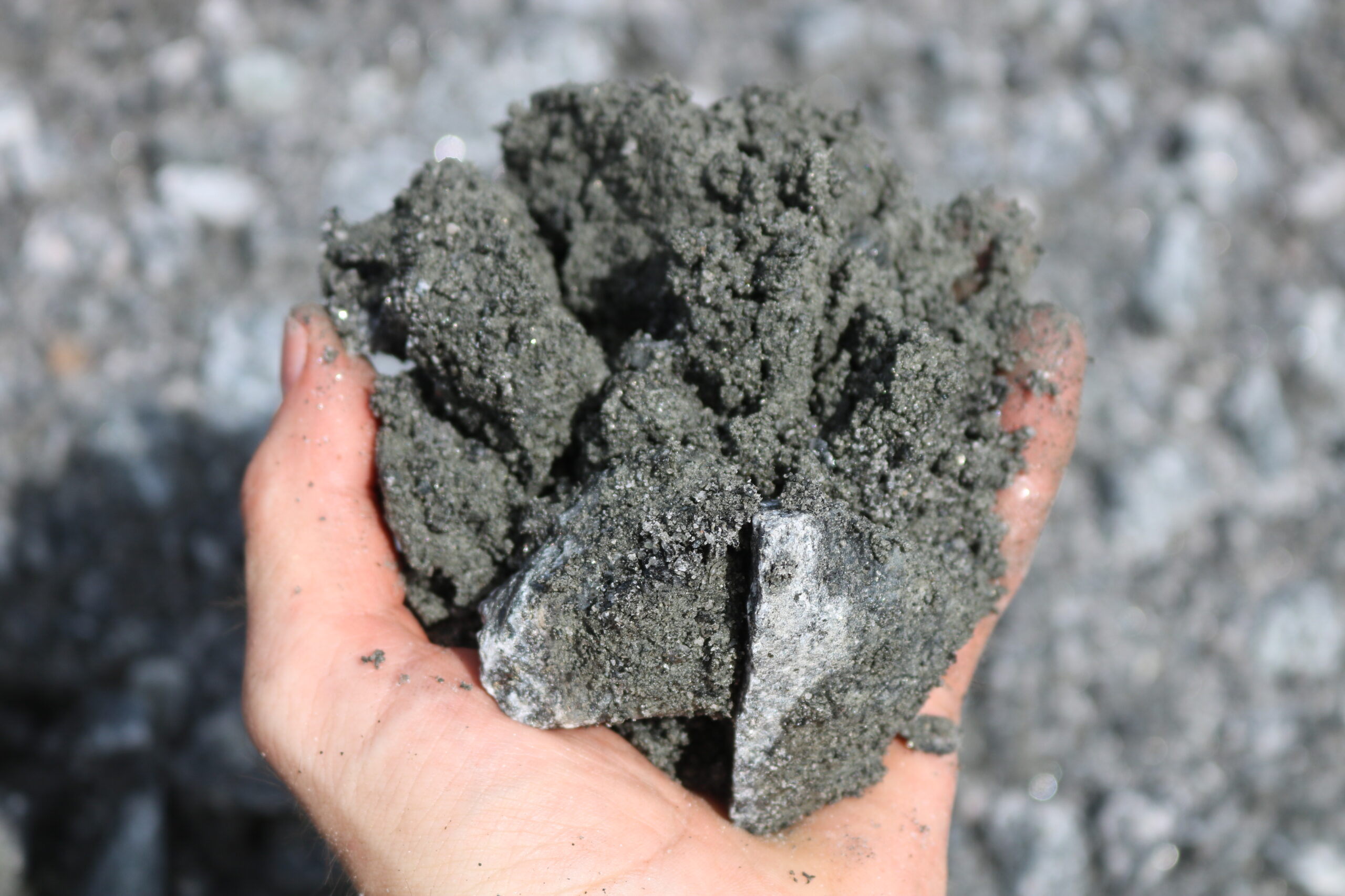 Close-Up of Crush n Run Gravel in Hand - PSK Landscape Supplies
