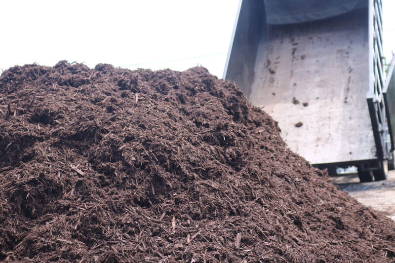 Pine Straw King Truck Delivering Bulk Mulch